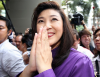 Yingluck Shinawatra z opozycyjnej partii Pheu Thai dziękuje zwolennikom za poparcie. Wstępne sondaże dawały opozycji większość w nowym parlamencie Tajlandii; lipiec 2011